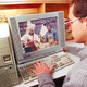 Joseph Ryback of Salinas, CA, enjoys an episode of <I>Home Improvement</I> on the Compaq Presario 6000. Ryback praised the advanced new computer system, calling it "just like TV, only a computer."